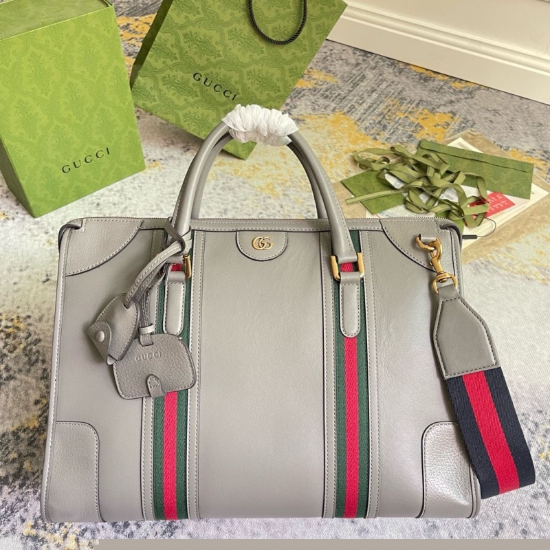 G*u*i top handle bags